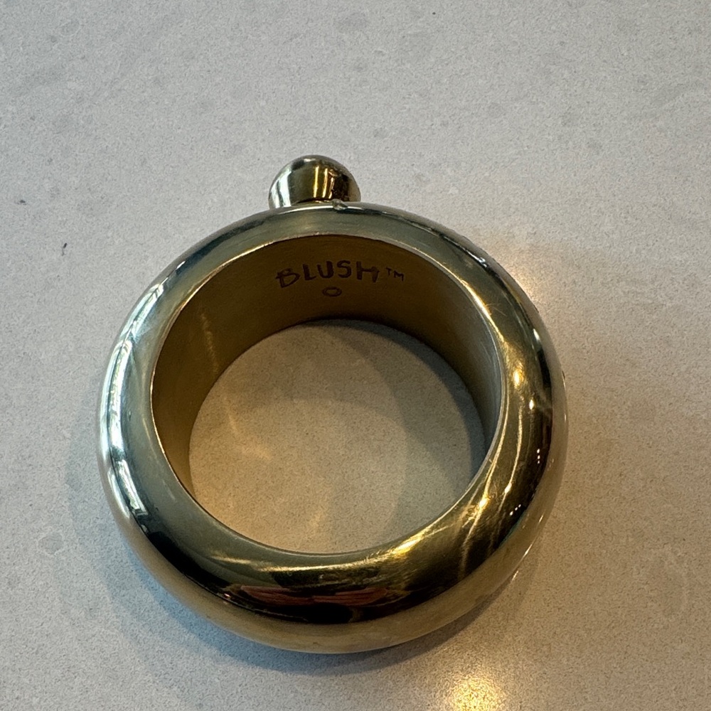 Blush Brass Bangle with liquid reservoir compartment.  Sip laugh love no leaks